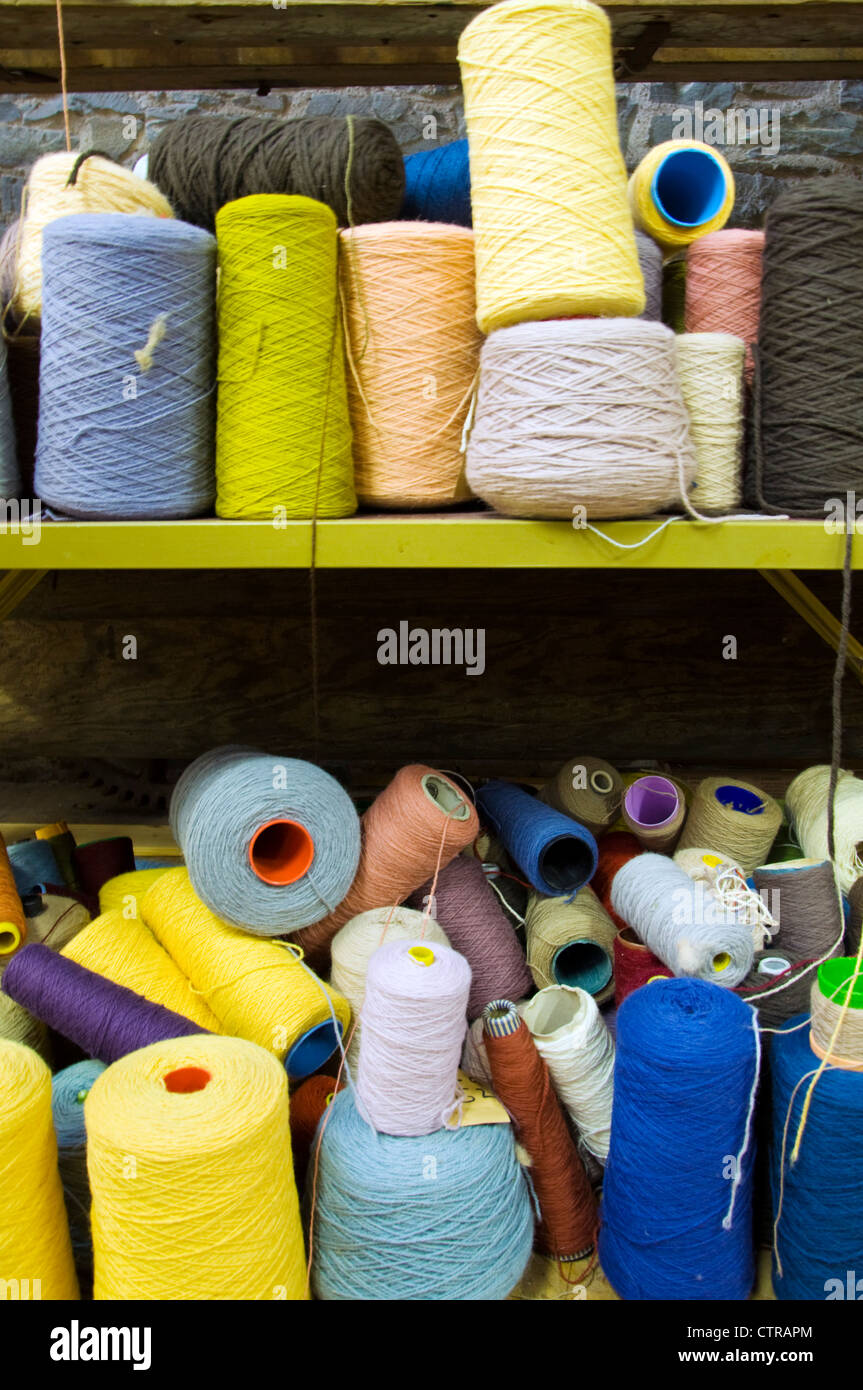 Spools of dyed wool used in carpet making Stock Photo Alamy