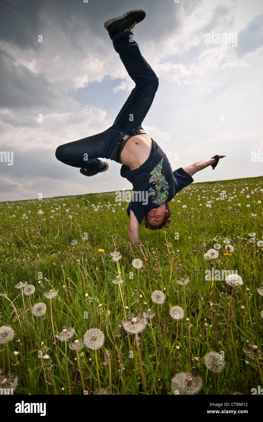Breakdancer on a meadow, Hip Hop Stock Photo
