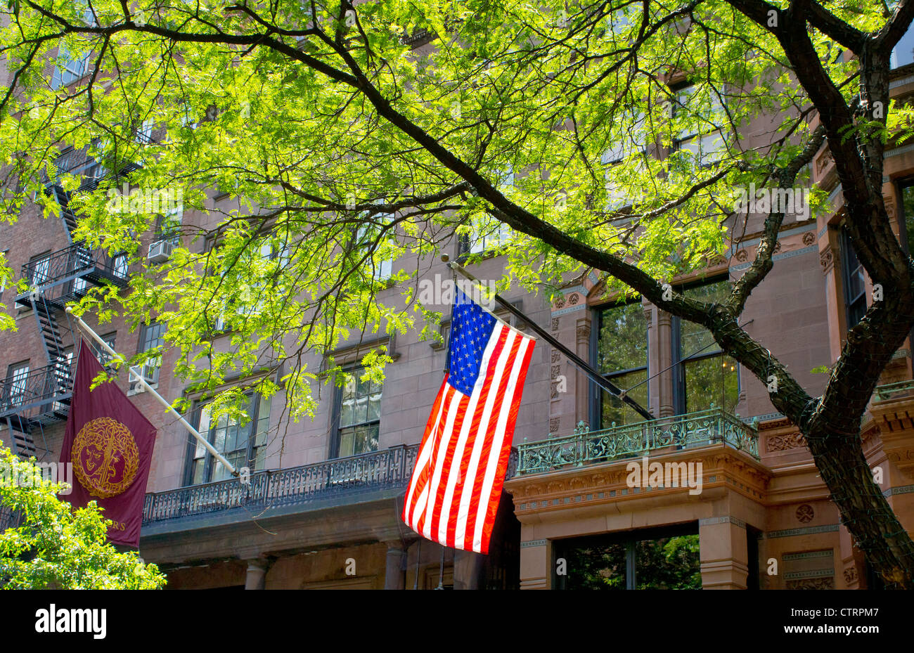 An American flag flies outside the National Arts Club in Gramercy Park, New York City Stock Photo