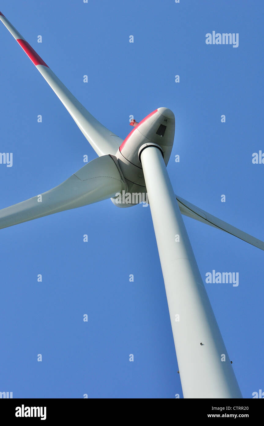 Wind turbine against blue sky Stock Photo - Alamy
