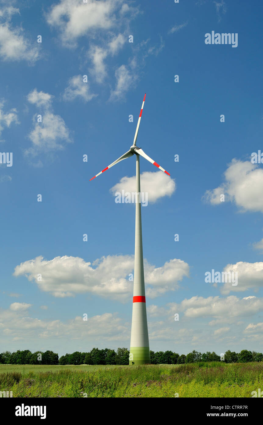 Wind turbine against blue sky Stock Photo - Alamy