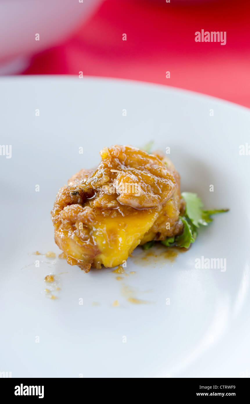 boiled egg fried with tamarind sauce , asian style cuisine Stock Photo