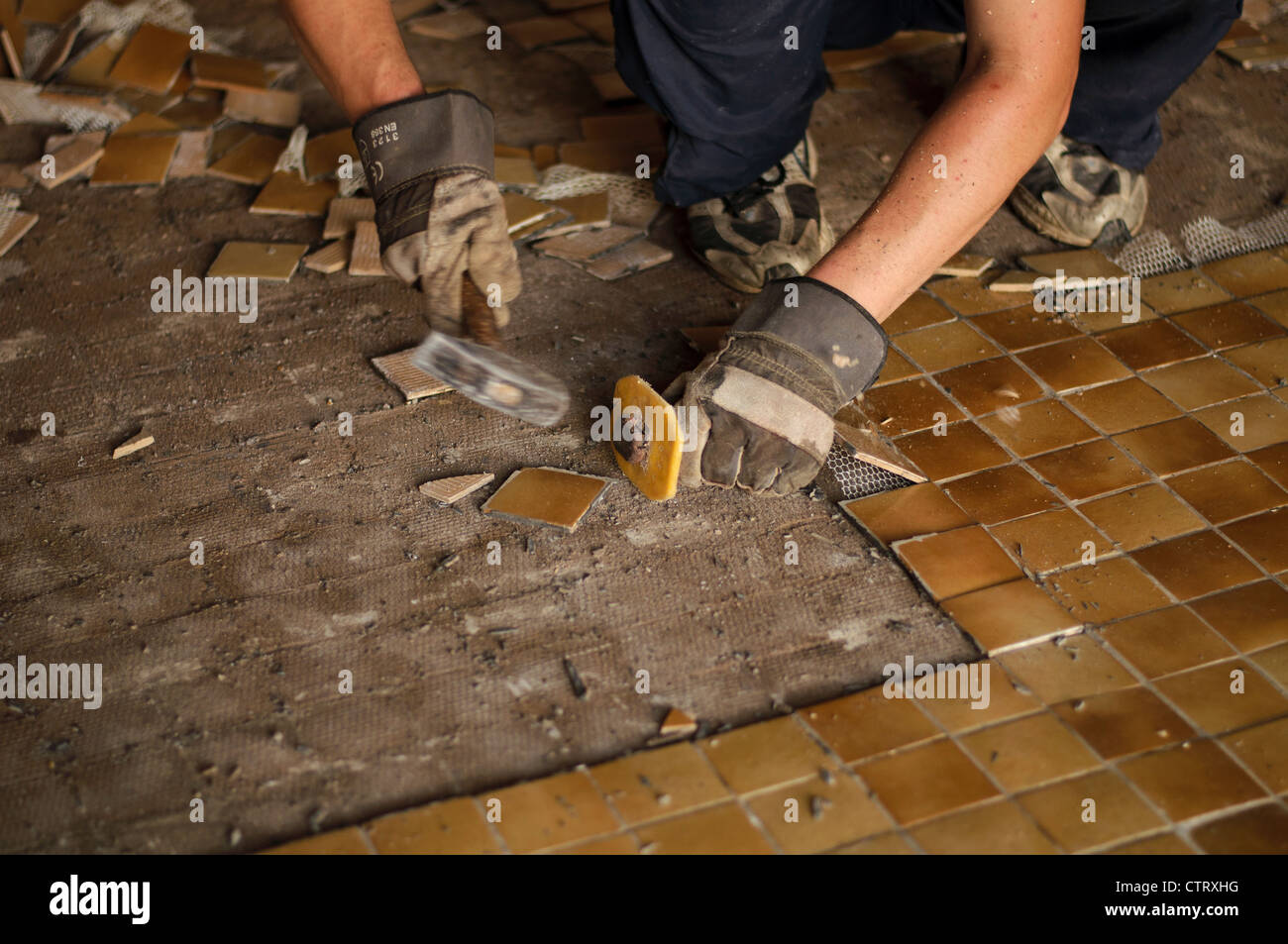 Removing tiles Stock Photo