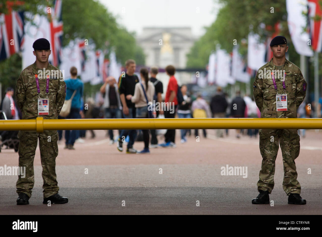 Soldiers of the British army stand guarding the entrance to the