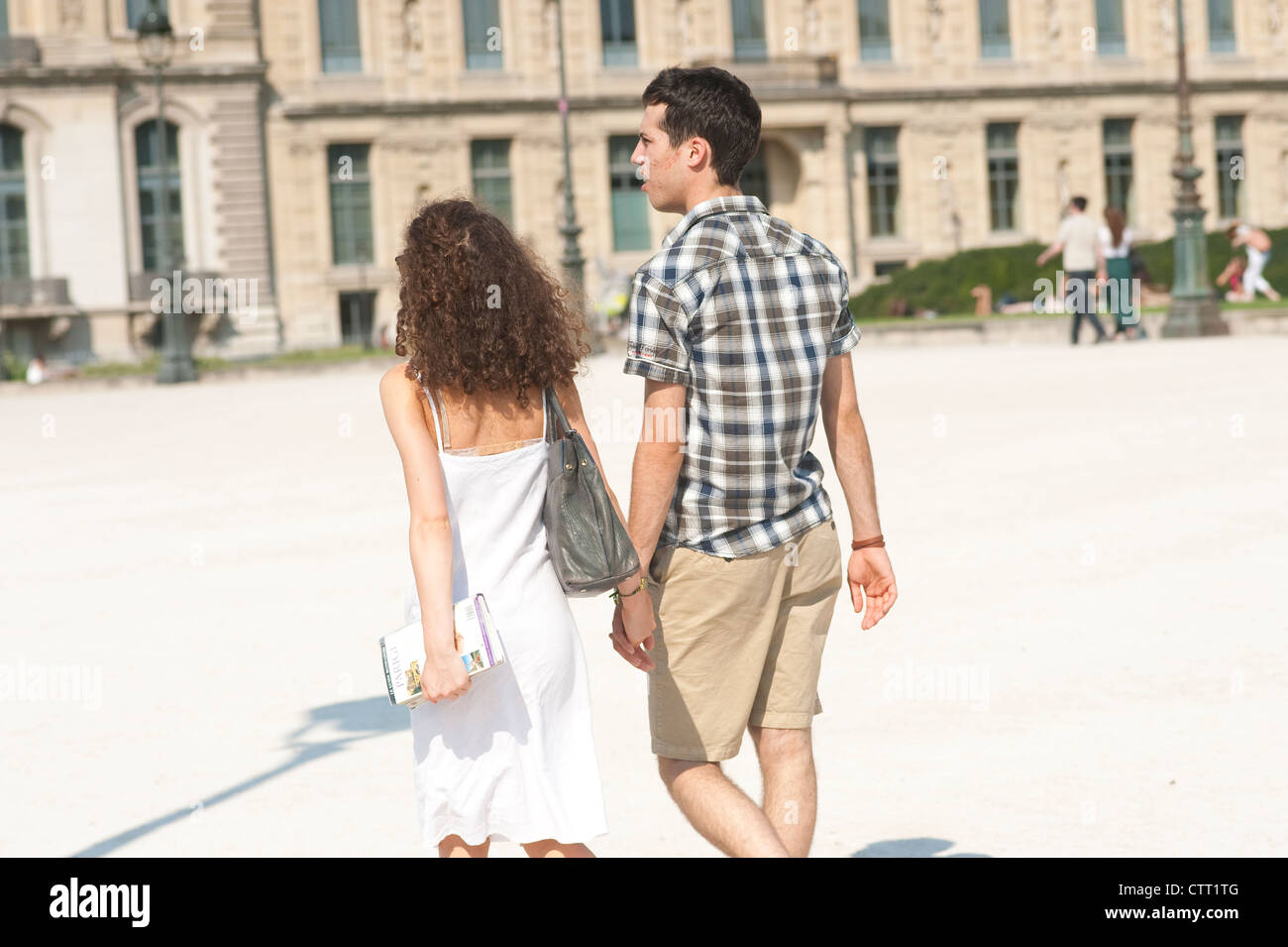 Paris, France - Young couple  walking outside Stock Photo