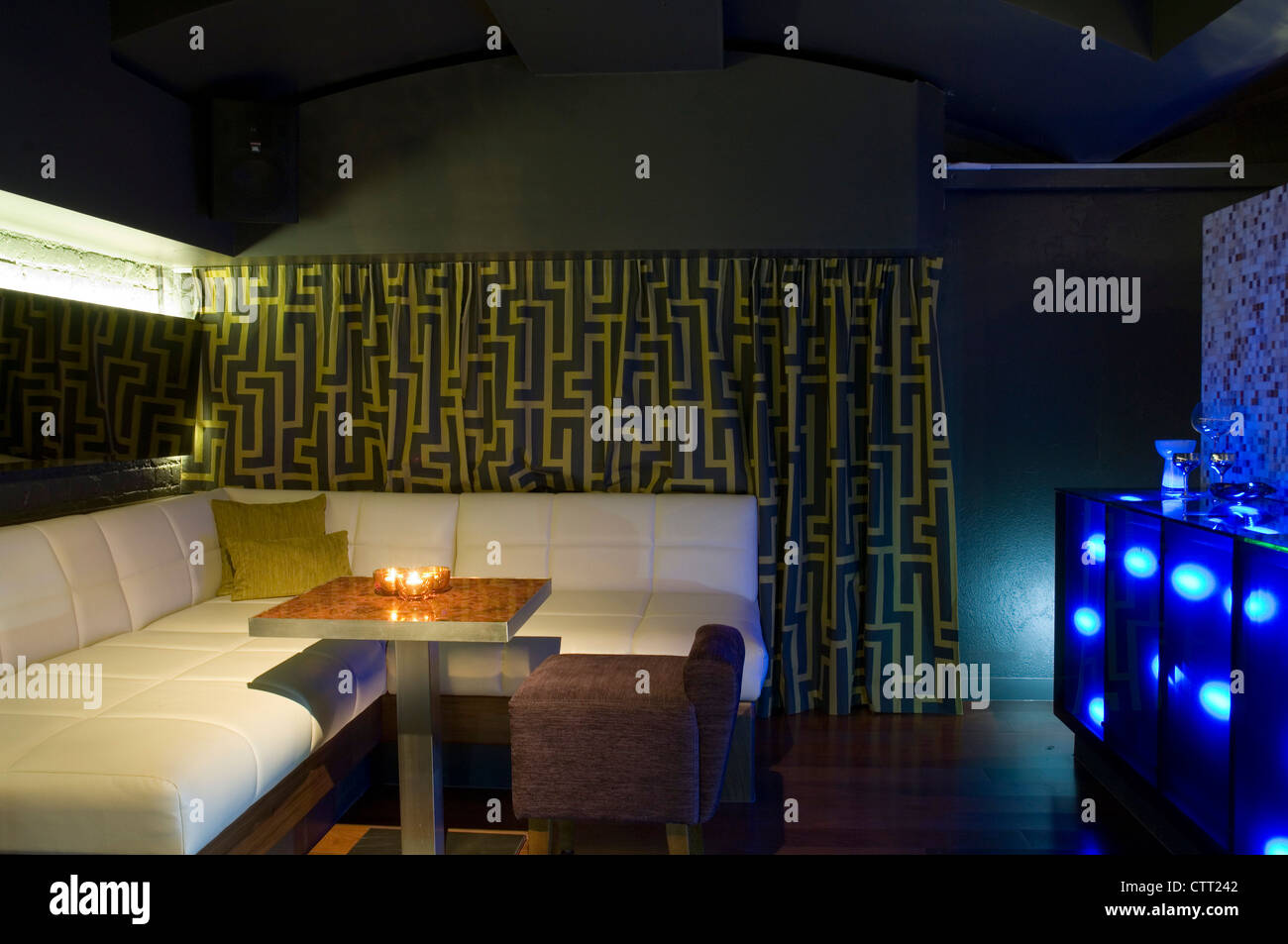 satmoko ball architects. bureau nightclub seating area detail with blue ...