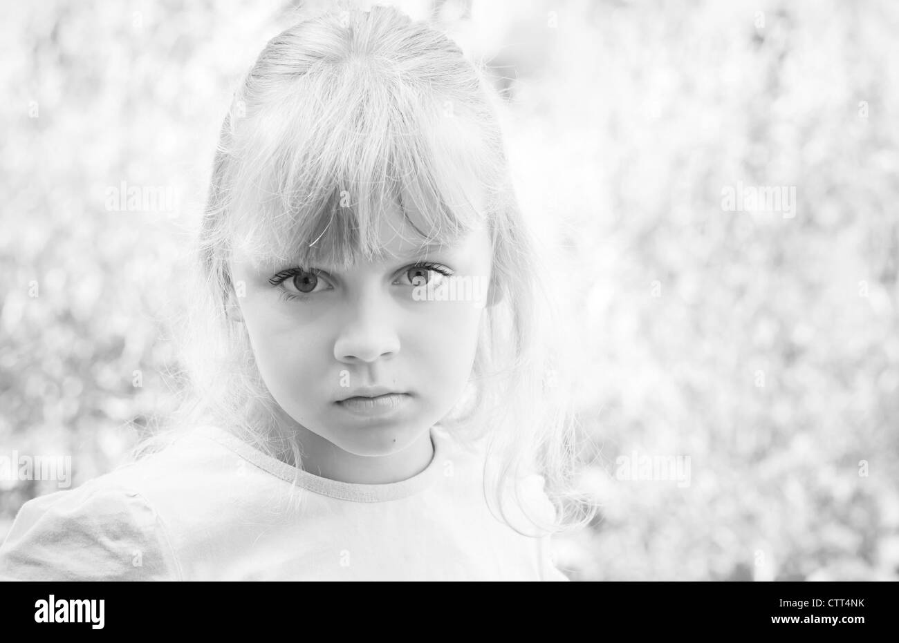 Monochrome portrait of a little blond beautiful Russian girl Stock Photo