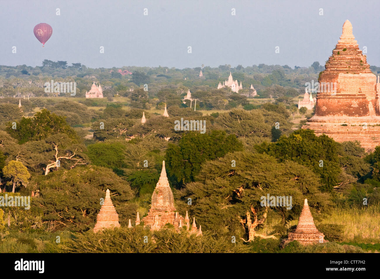 Myanmar, Burma, Bagan. Hot-air Balloons offer Tourists an Aerial View of the Temples. Stock Photo