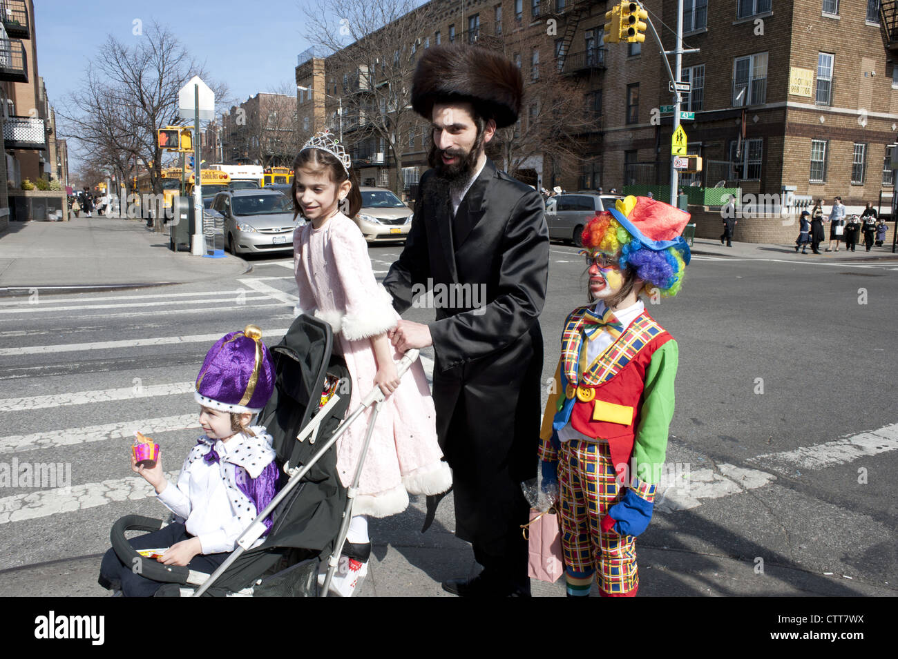 Religious, Jewish family celebrates the holiday of Purim in the Borough Park section of Brooklyn, NY. Stock Photo