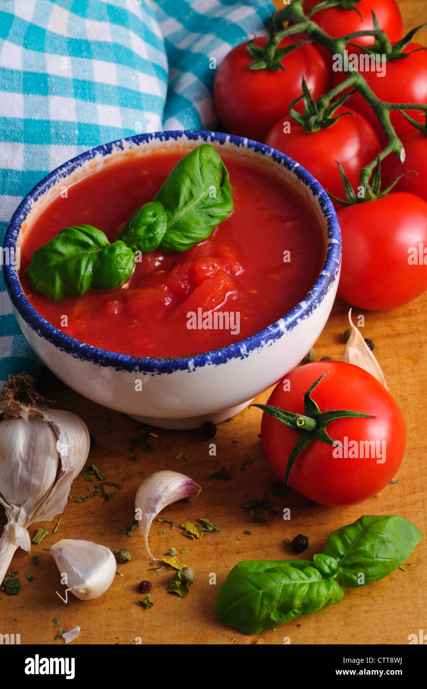 Traditional homemade tomato sauce and ingredients Stock Photo