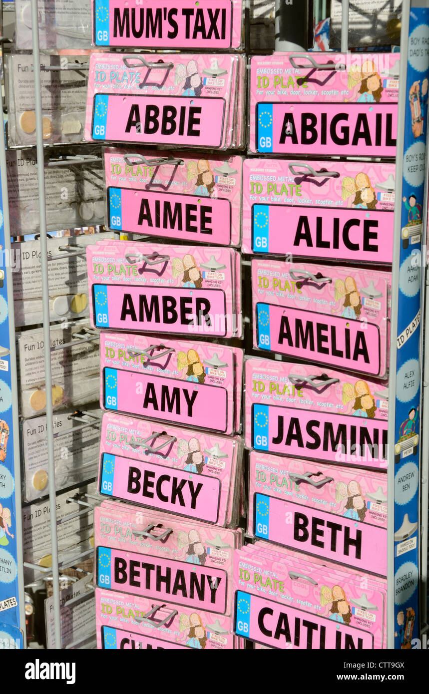 ID plates containing girls' names on a souvenir stand, London, UK Stock