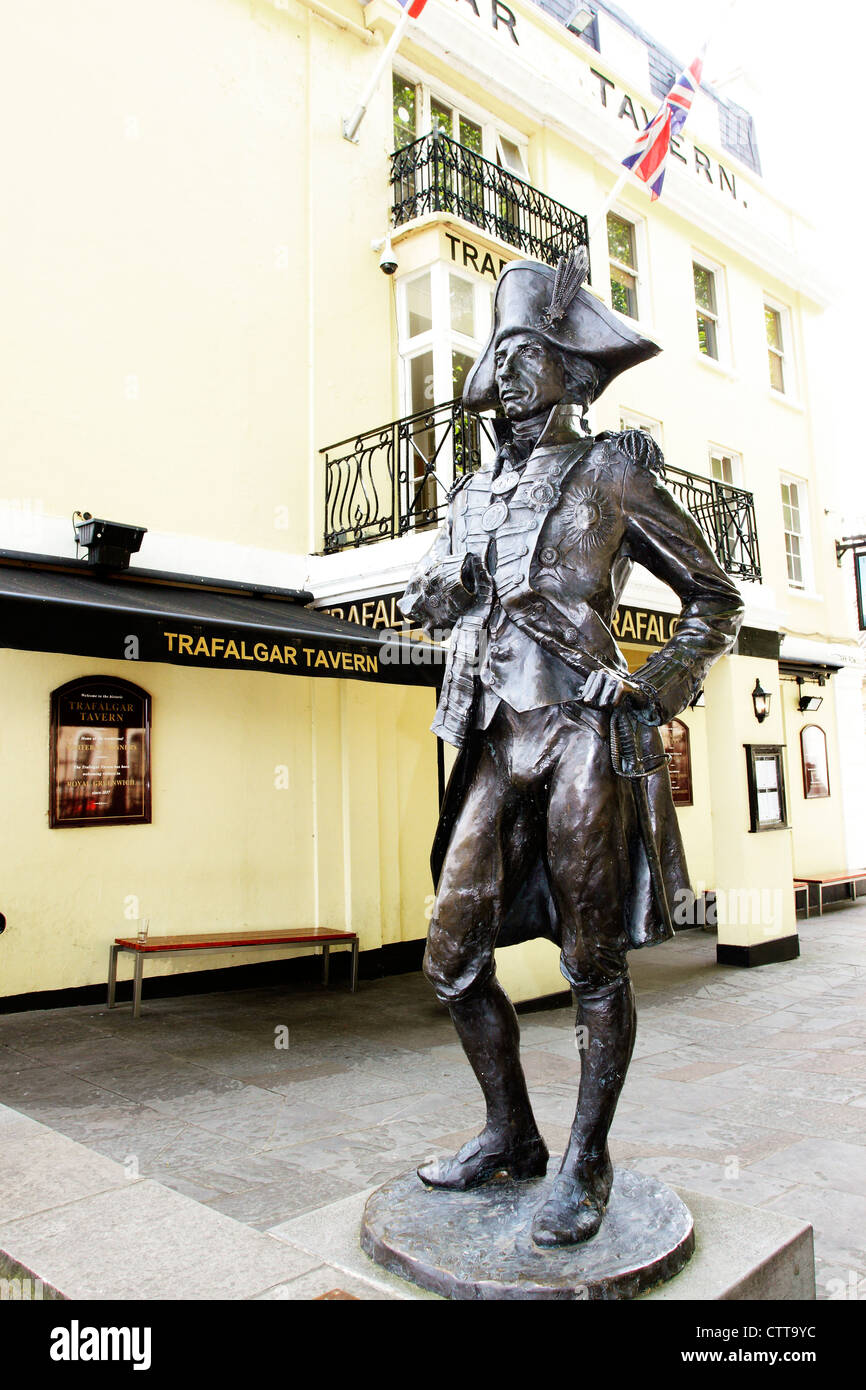 A statue of Admiral Nelson standing outside the Trafalgar Tavern on the riverside in the Royal Borough of Greenwich, London. Stock Photo