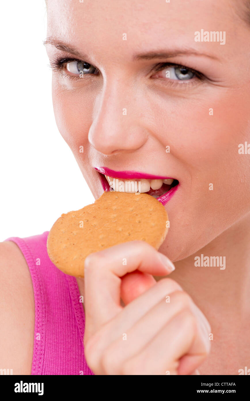 woman eating a digestive biscuit Stock Photo Alamy