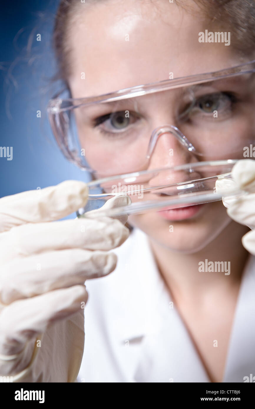 A young female student in the chemical laboratory Stock Photo