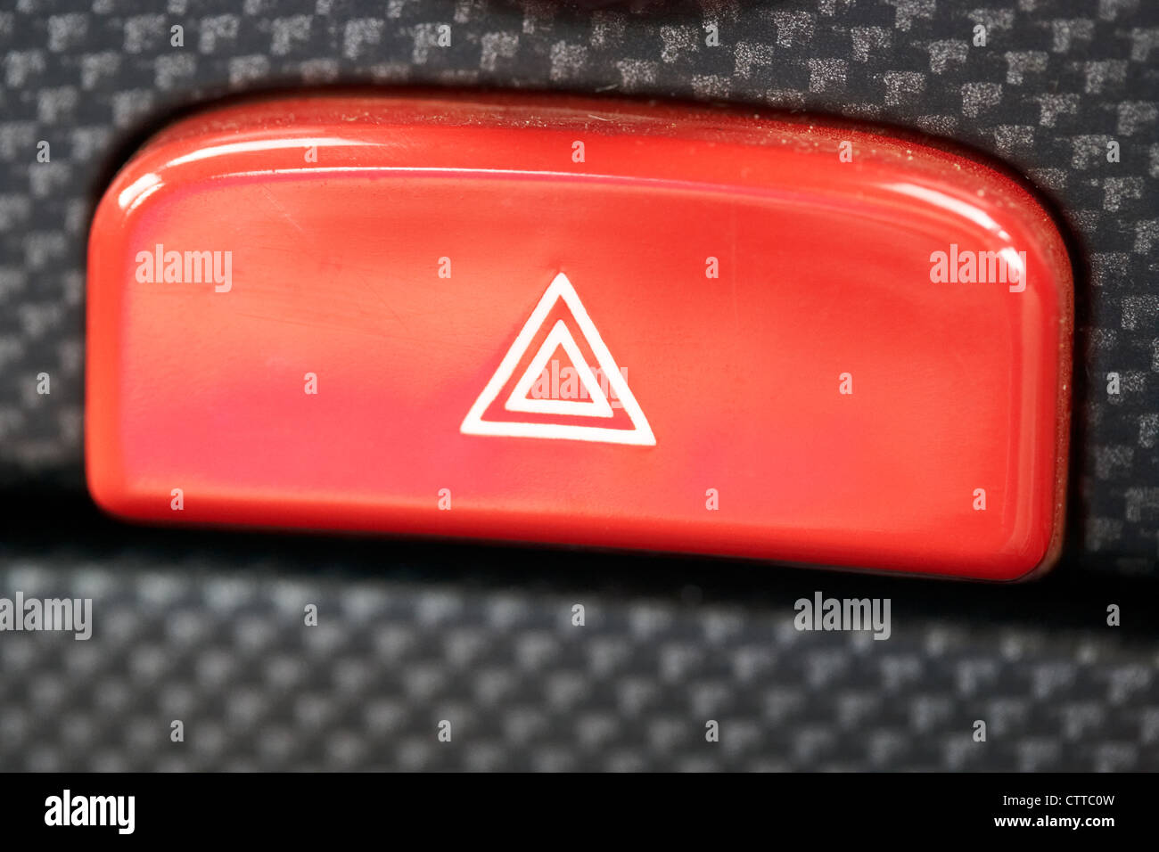 in car hazard warning light button Stock Photo