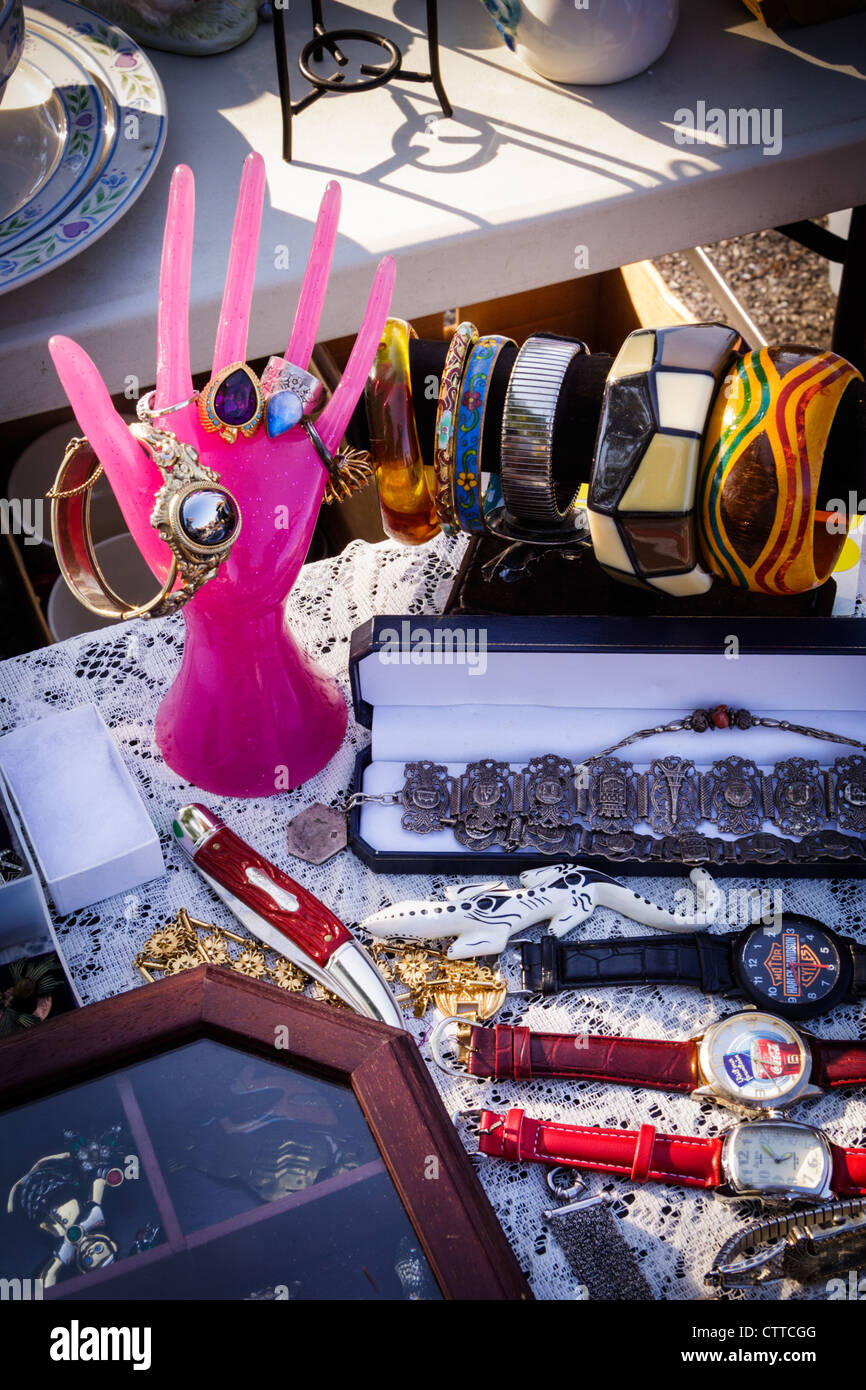 A display of collectible jewelry at a flea market Stock Photo