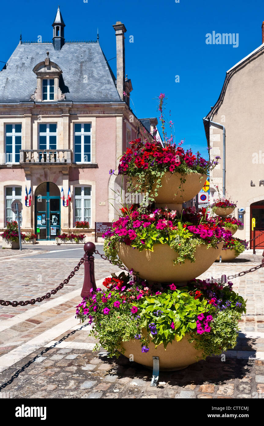 Triple planter with Begonias and flowers - France. Stock Photo