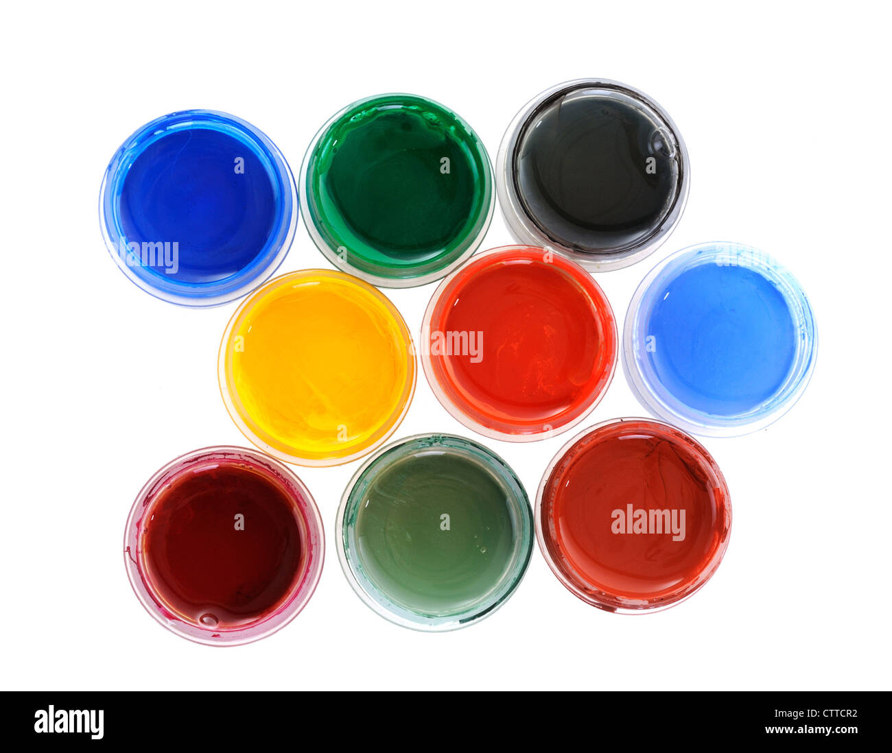 Many cans with different paints on white background Stock Photo