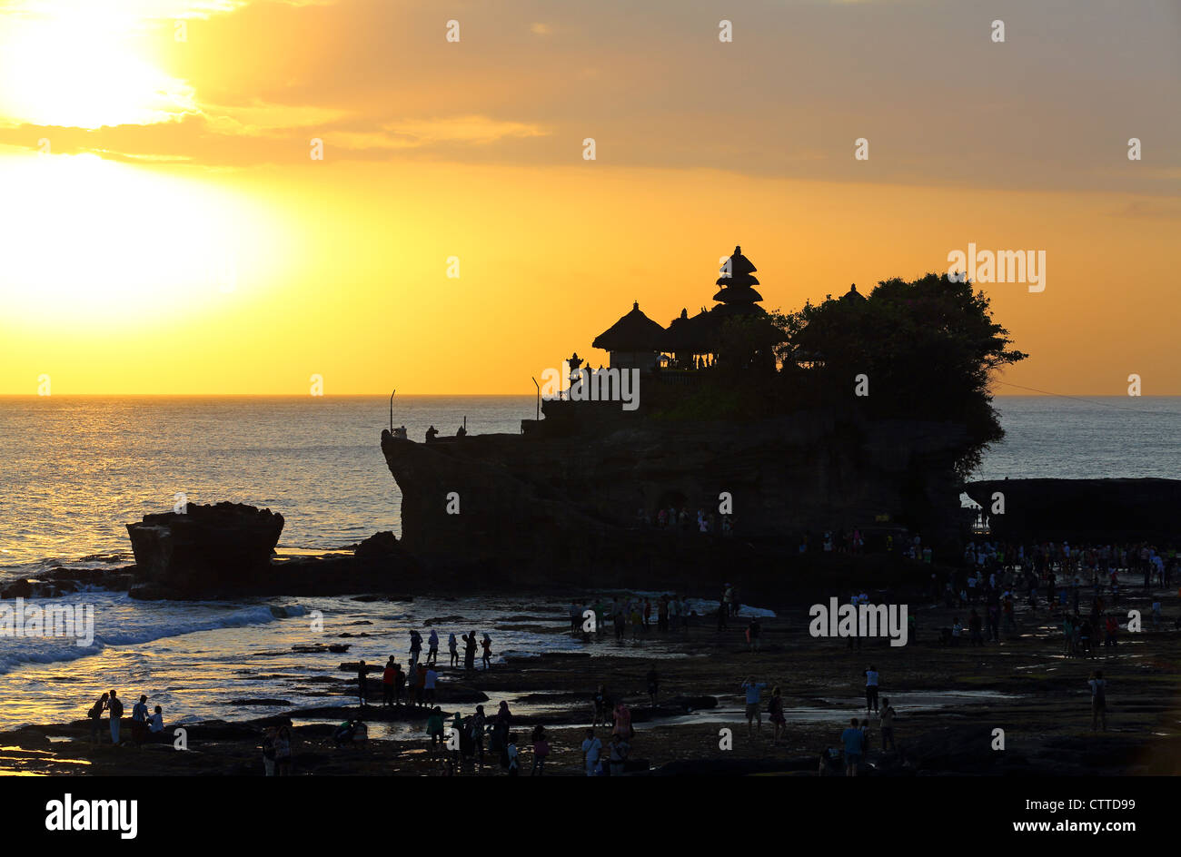 Tanah Lot temple in Bali at sunset Stock Photo - Alamy