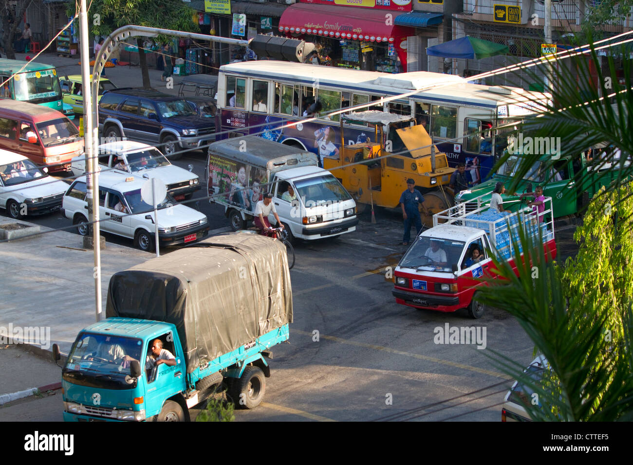 Traffic on the street in (Rangoon) Yangon, (Burma) Myanmar. Stock Photo
