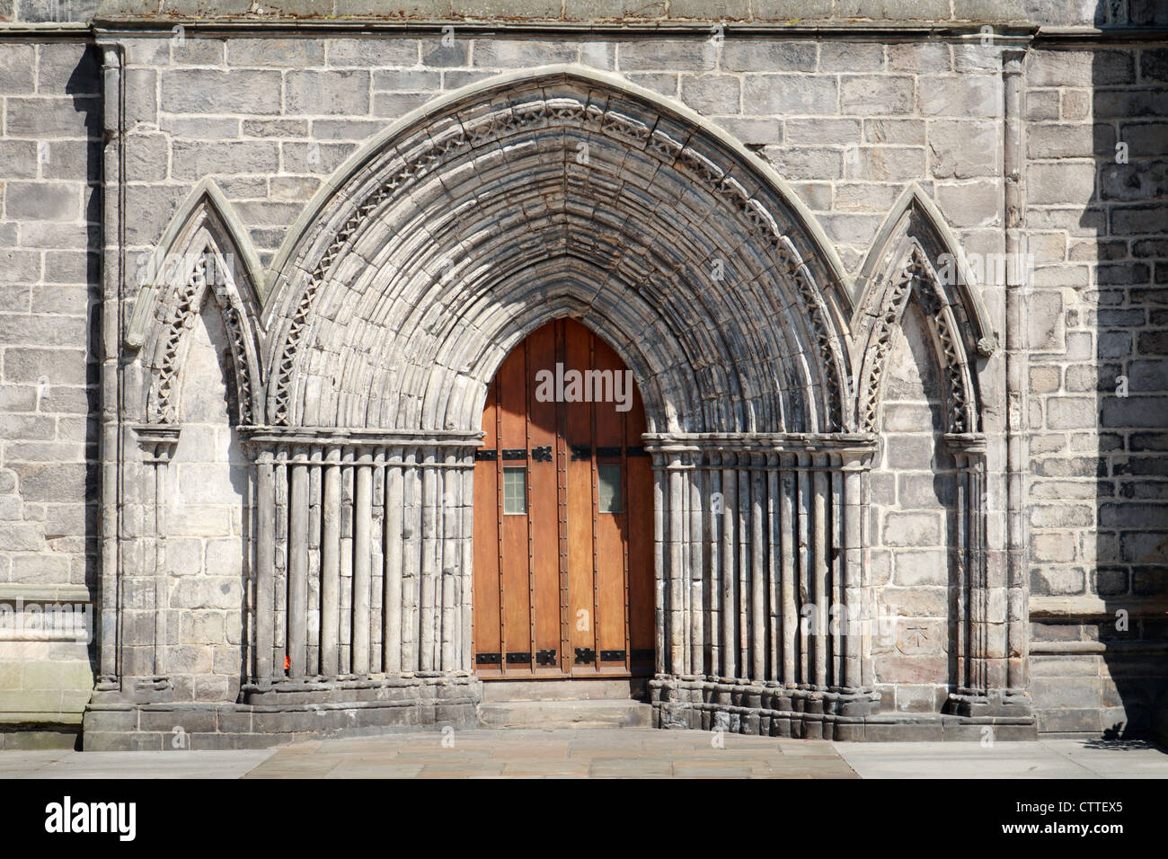 Entrance door and mouldings to medieval church of Paisley Abbey, Scotland. Stock Photo