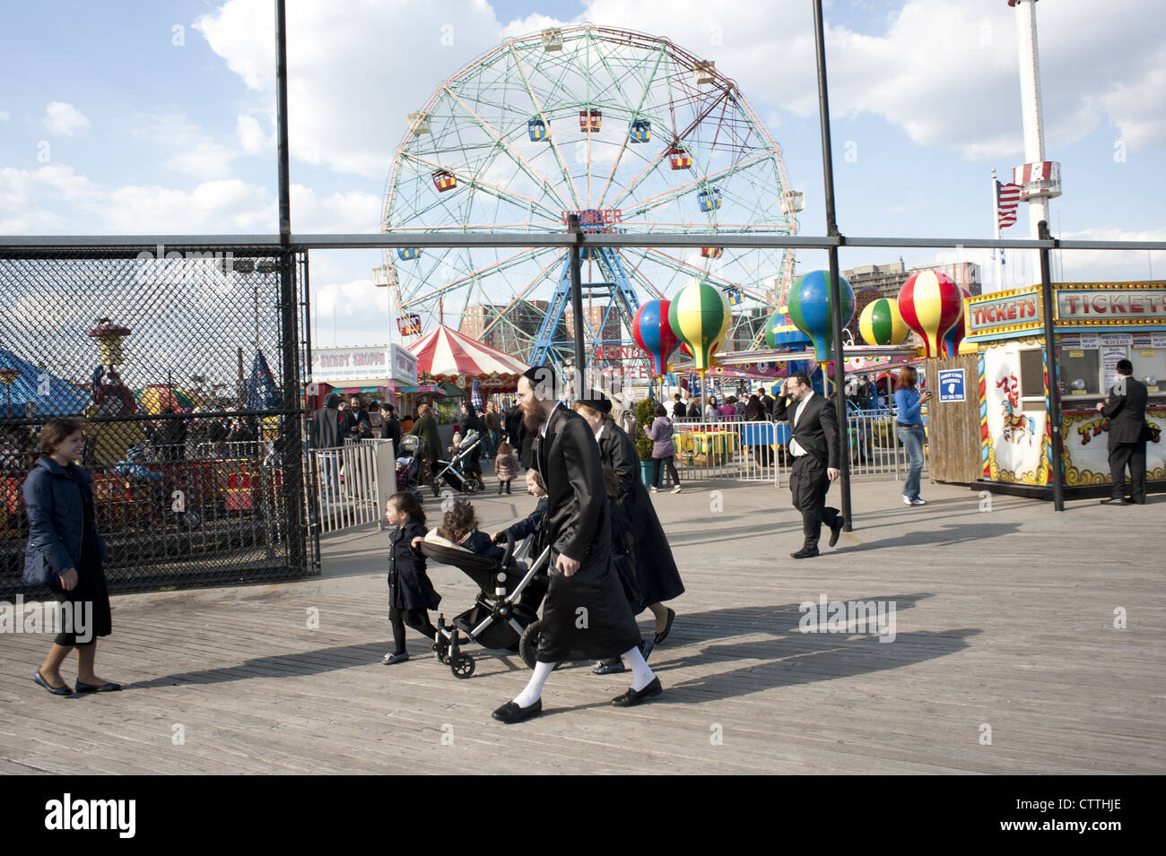 Religious, Jewish families enjoy a day at Coney Island Stock Photo - Alamy