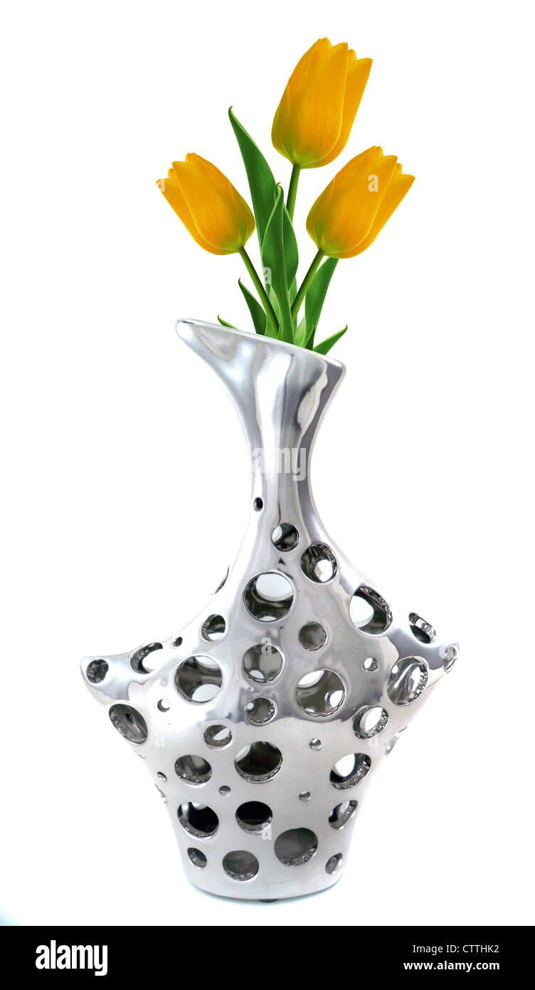 stylish and modern Silver Vase with tulips isolated on white. Stock Photo