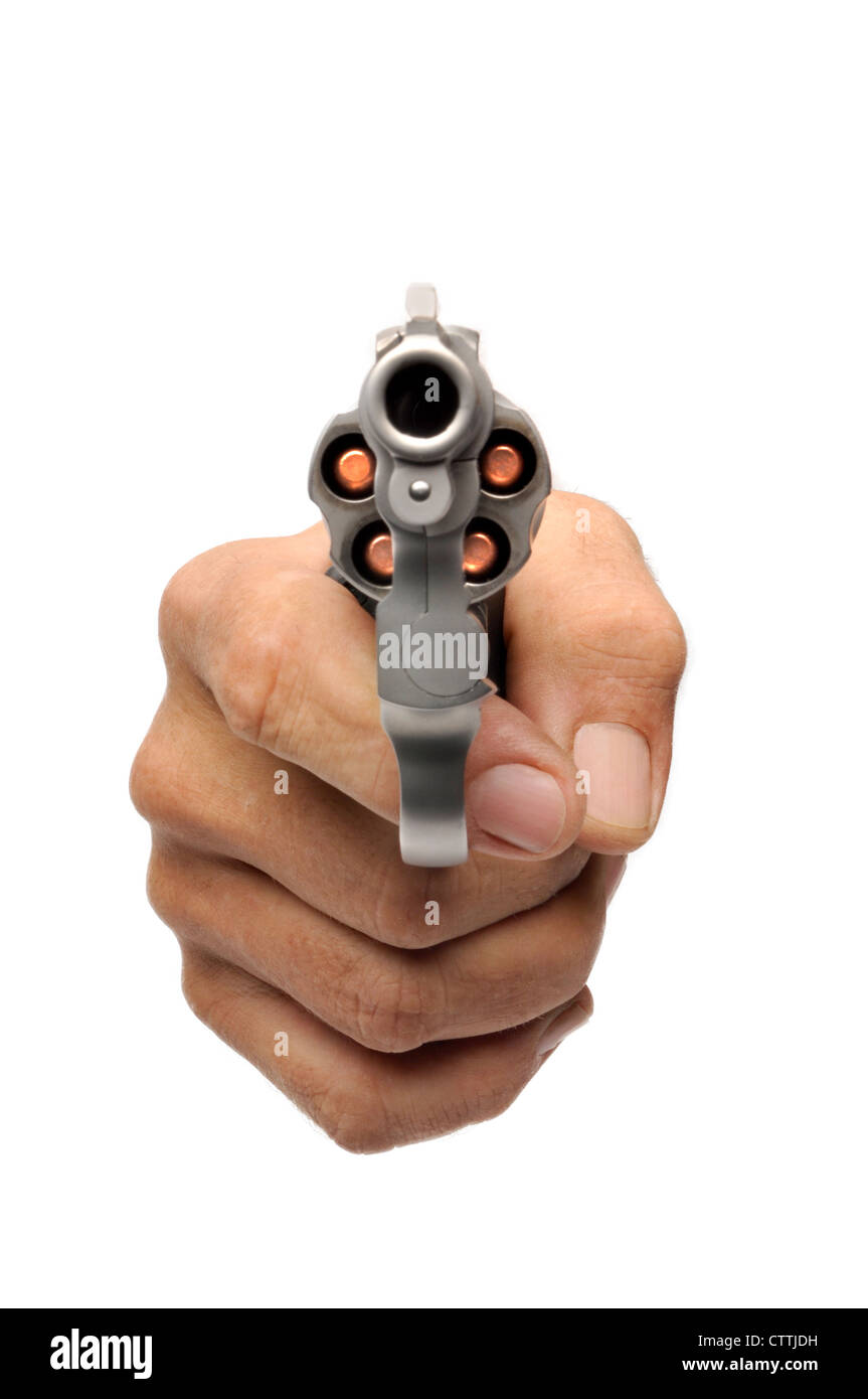 hand holding loaded smith and wesson lady smith 38 special revolver handgun and bullets Stock Photo