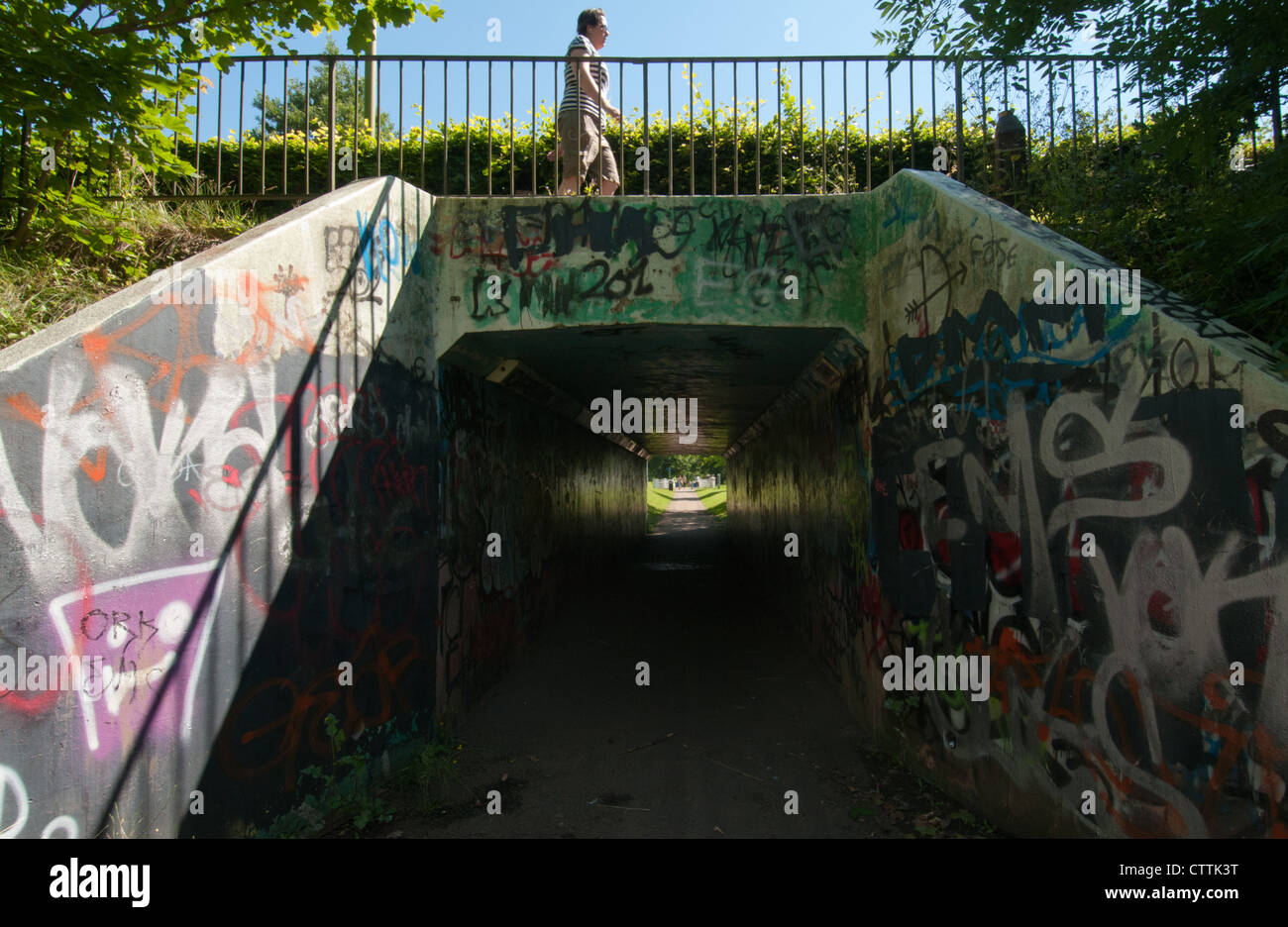 Graffiti covered pedestrian underpass, UK. Stock Photo