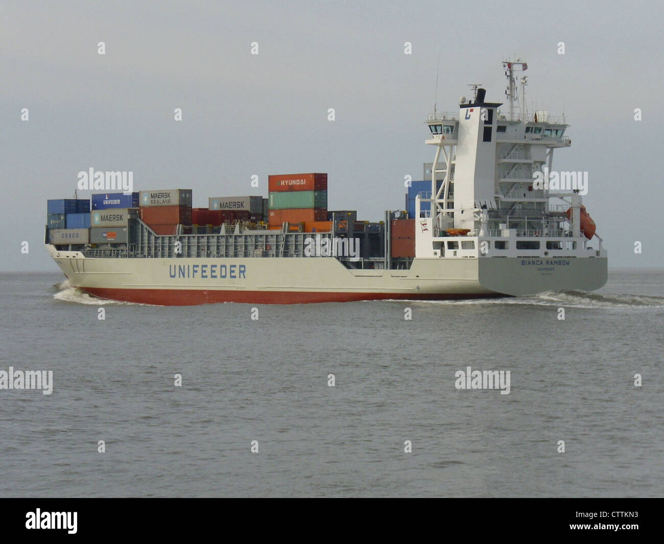 The feeder ship Bianca Rambow is outbound on the Weser River, Germany ...