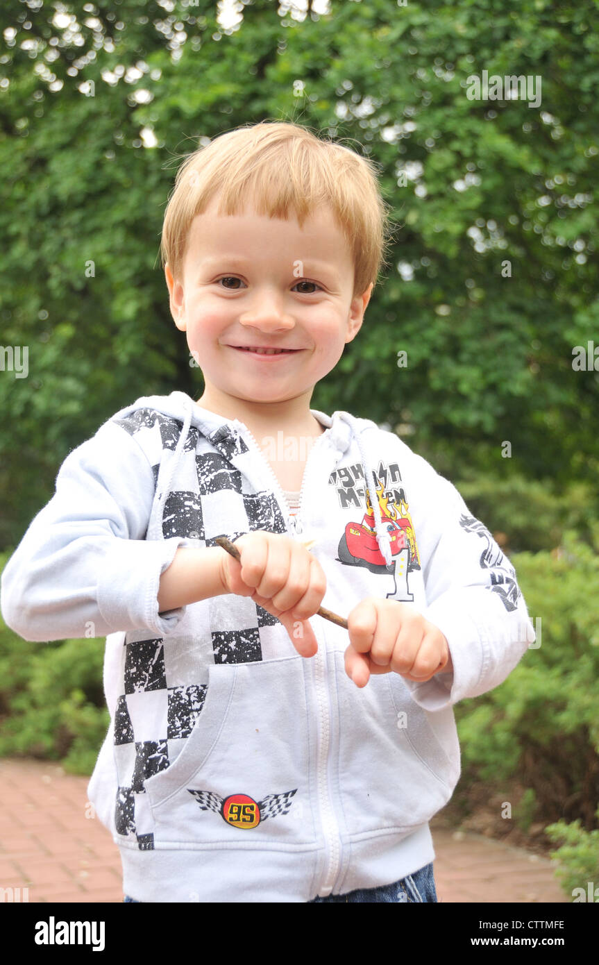 Portrait of a toddler boy smiling outdoor Stock Photo Alamy