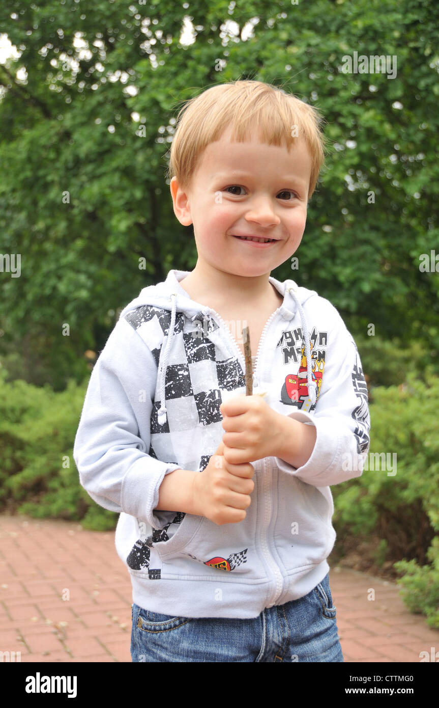 Portrait of a toddler boy smiling outdoor Stock Photo Alamy