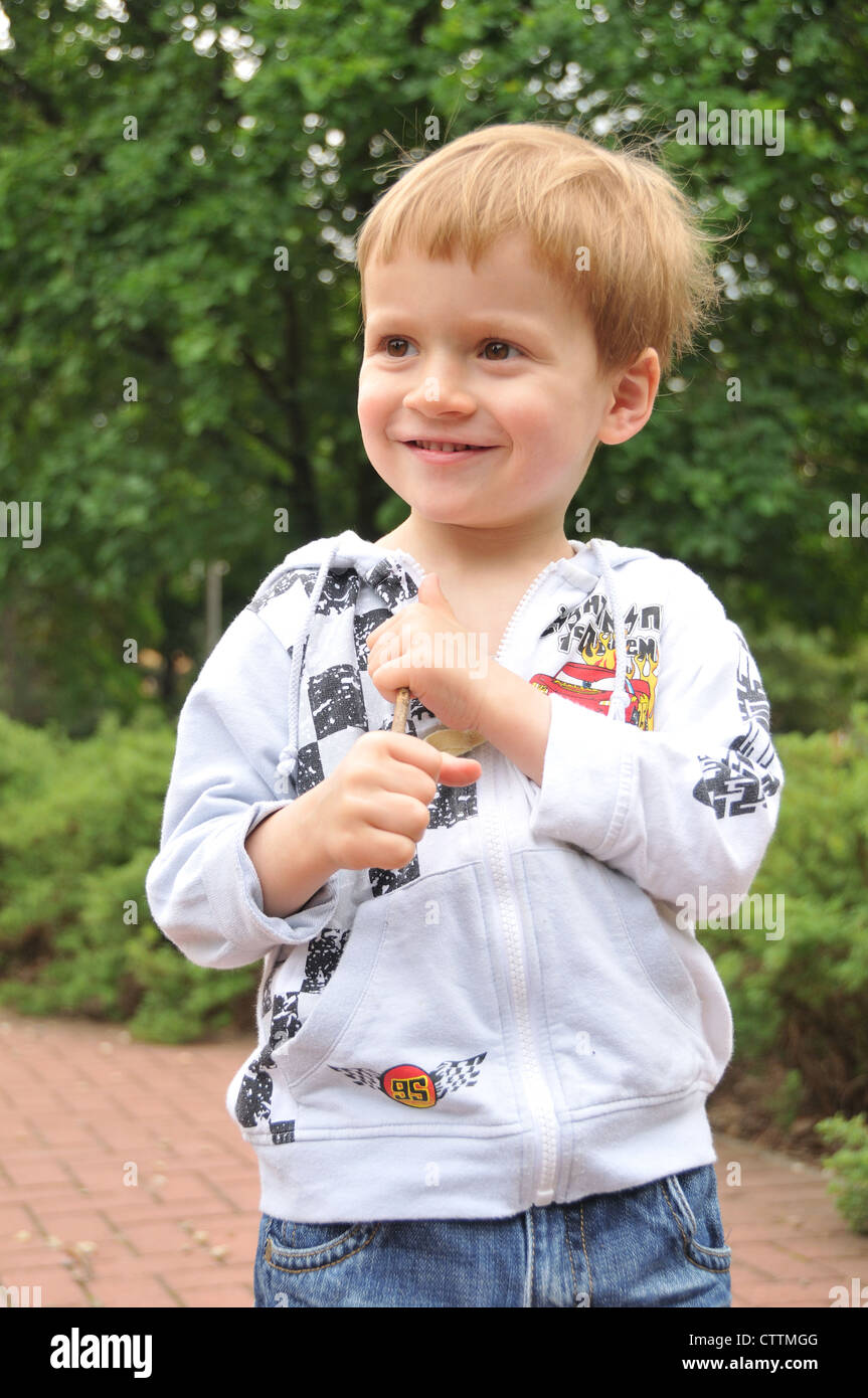 Portrait of a toddler boy smiling outdoor Stock Photo Alamy