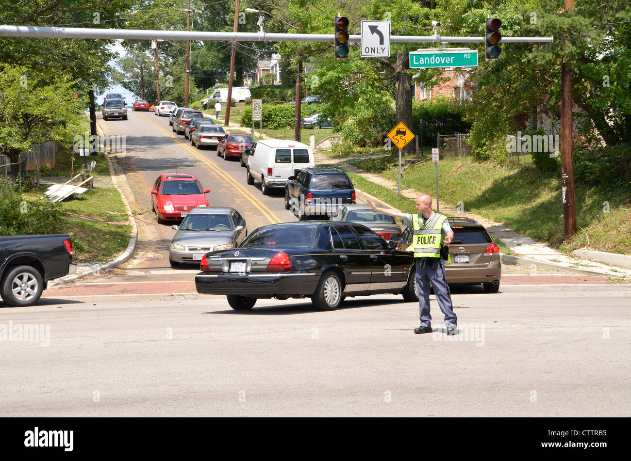 police directing traffic after a power failure knocked out the traffic lights at an intersection in Bladensburg, Maryland Stock Photo