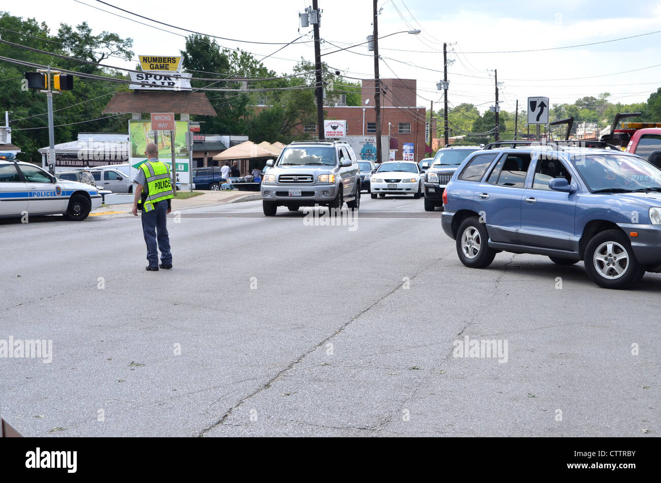 police directing traffic after a power failure knocked out the traffic lights at an intersection in Bladensburg, Maryland Stock Photo