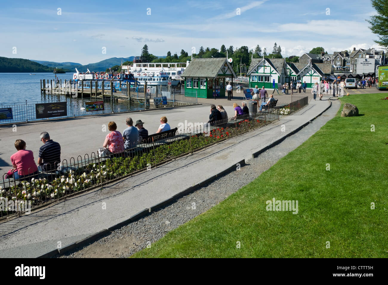 People visitors tourists on the promenade overlooking Lake Windermere in summer Bowness-on-Windermere Cumbria England UK United Kingdom Great Britain Stock Photo