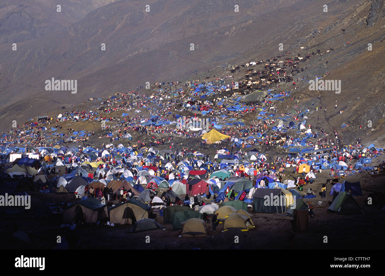 Pilgrim camp at the foot of Sinakara Mountain. Qoyllur Ritti Pilgrimage, Ocongate, Cuzco Department, Peru. Stock Photo
