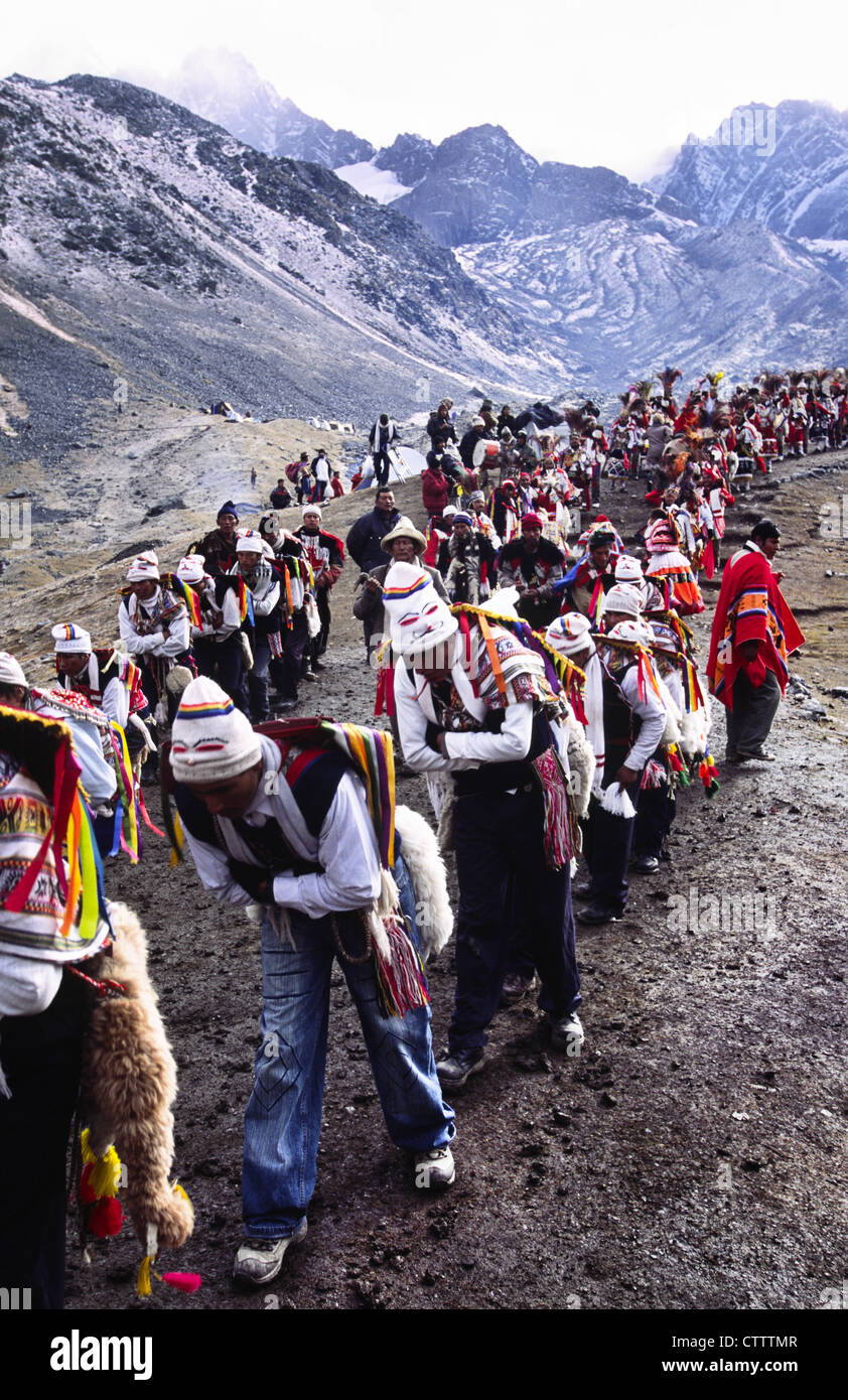 Procession returning from the snow star glacier during the Qoyllur Ritti Pilgrimage. Ocongate, Cuzco Department, Peru. Stock Photo