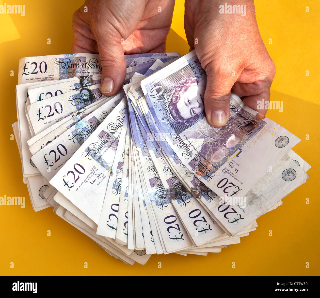 Cash in hand Stock Photo