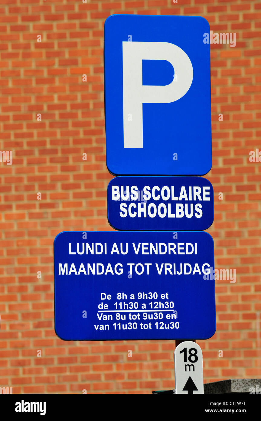 Brussels, Belgium. Bilingual sign parking for school buses (cleaned up digitally Stock Photo