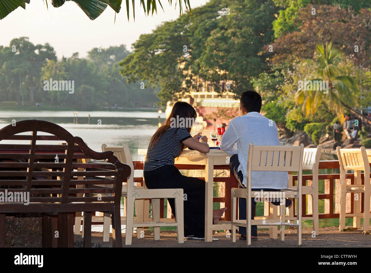 Couple at Kandawgyi Lake, Yangon, Myanmar Stock Photo