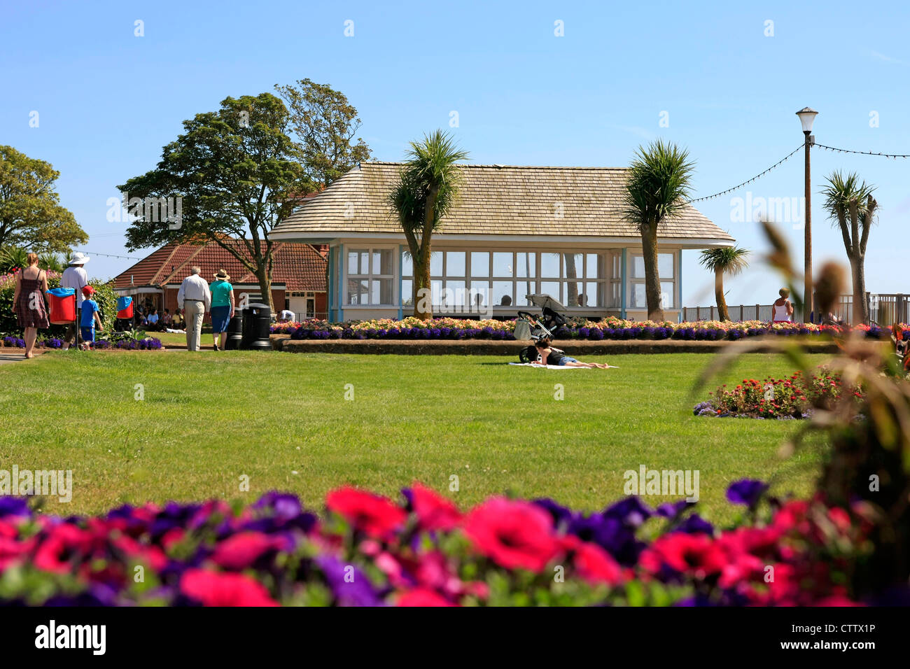 Exmouth Esplanade Gardens with it's 1930s windbreak shelters Stock Photo Alamy