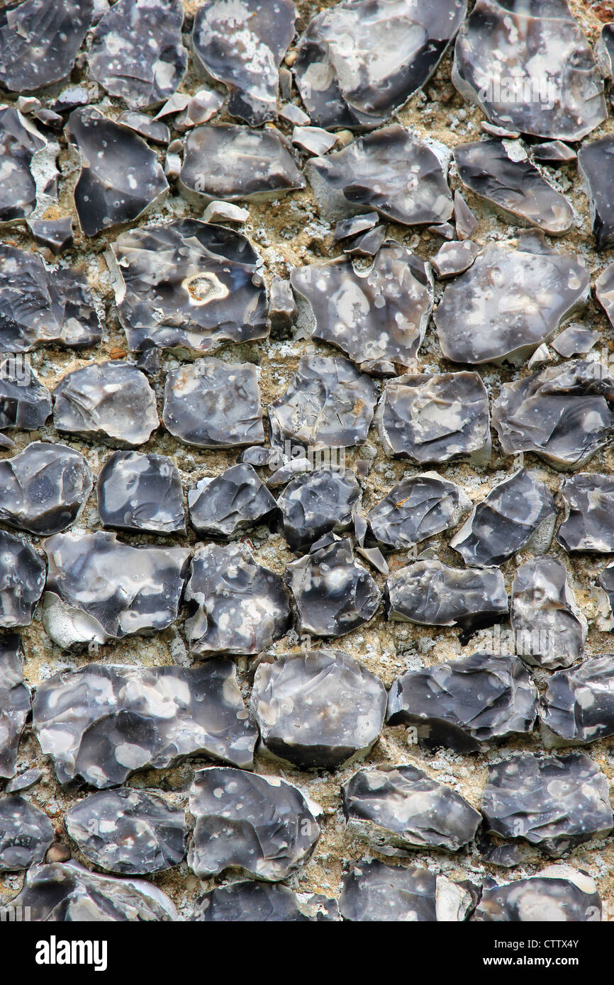 knapped flint wall of village church Walberswick Southwold Suffolk