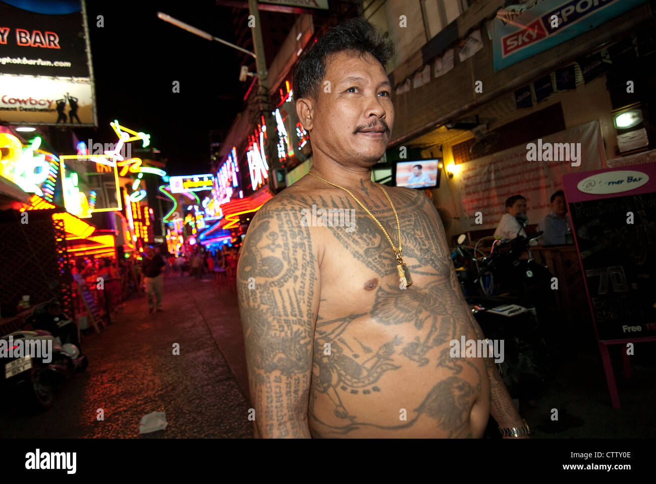 Sak Yan Tattoos. Club security. Soi Cowboy. Bangkok. Stock Photo