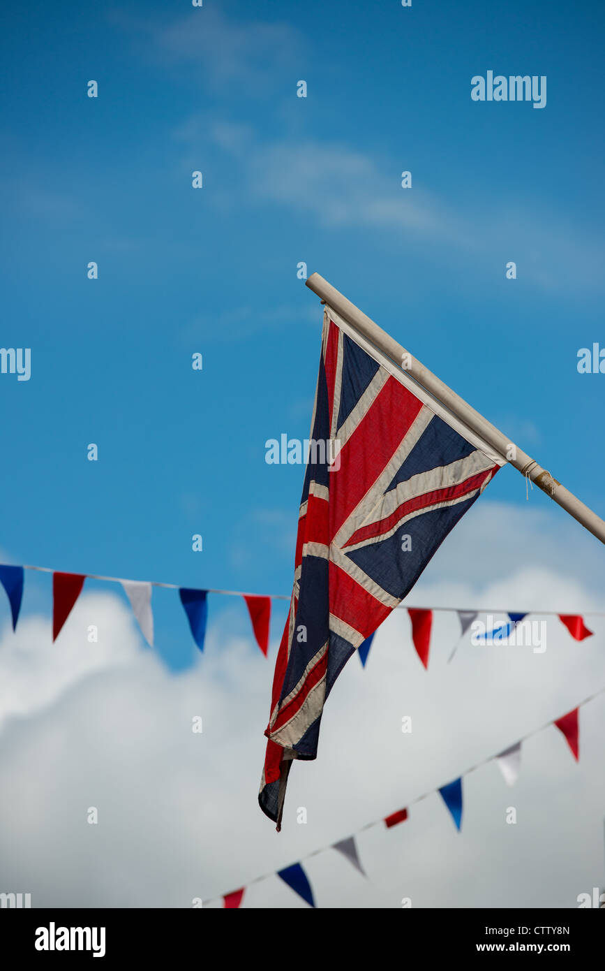 Union Jack with red, white and blue bunting in Worcester during HM The Queen's Royal Visit in July 2012. Stock Photo