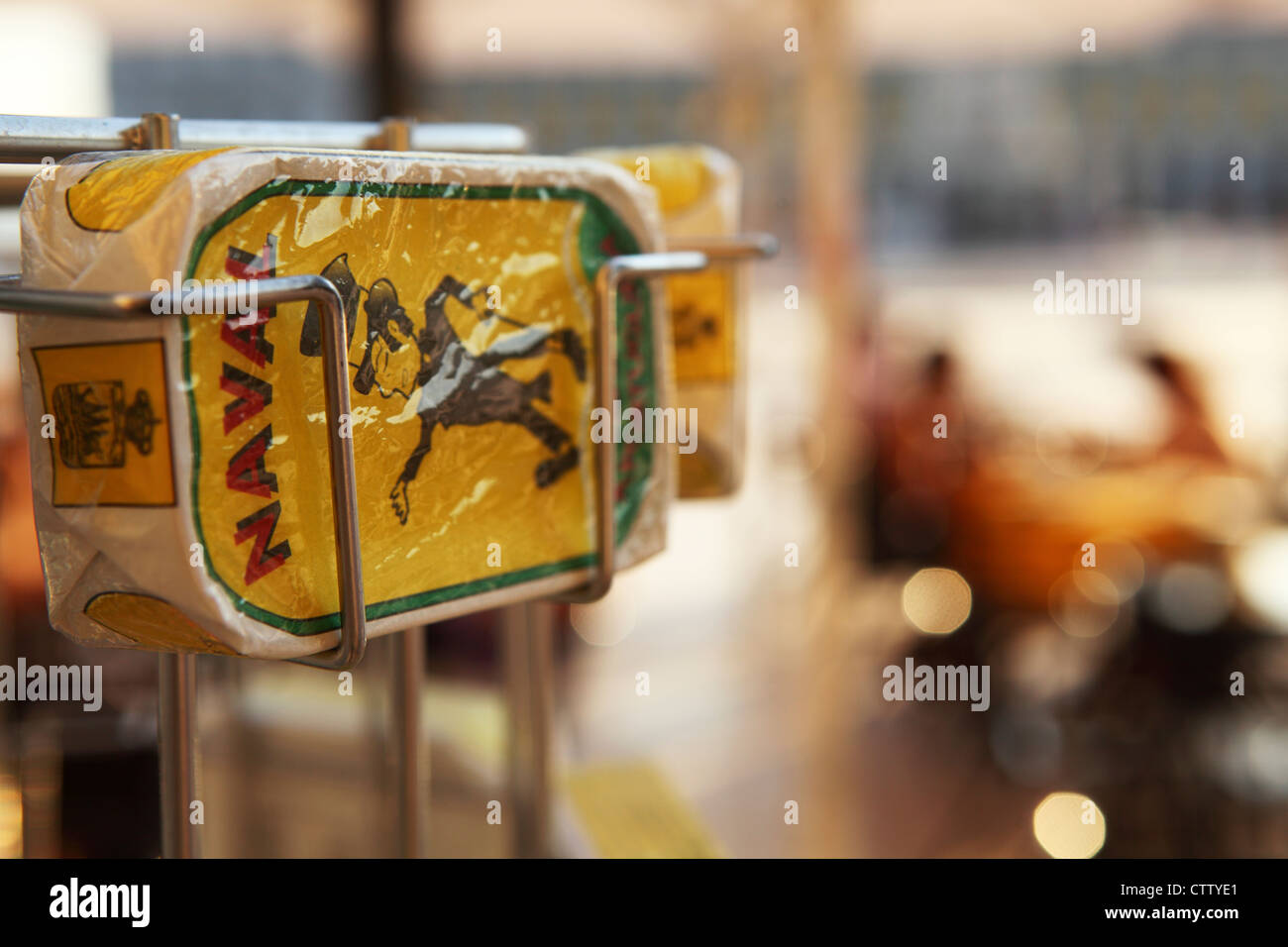 A can of tinned fish is displayed outside of a restaurantbar in