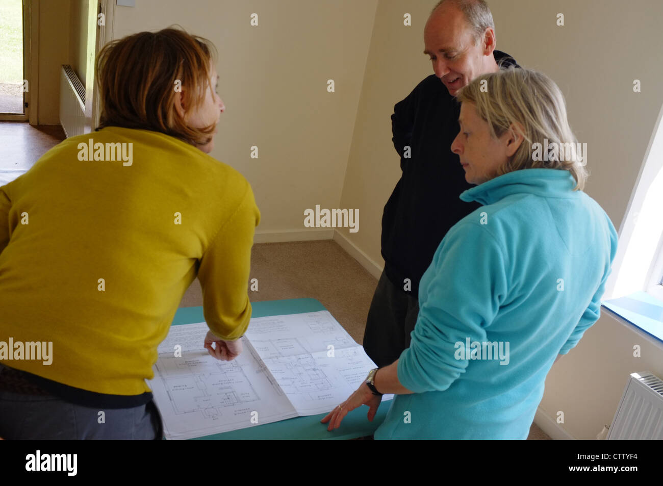 People planning a house conversion Stock Photo