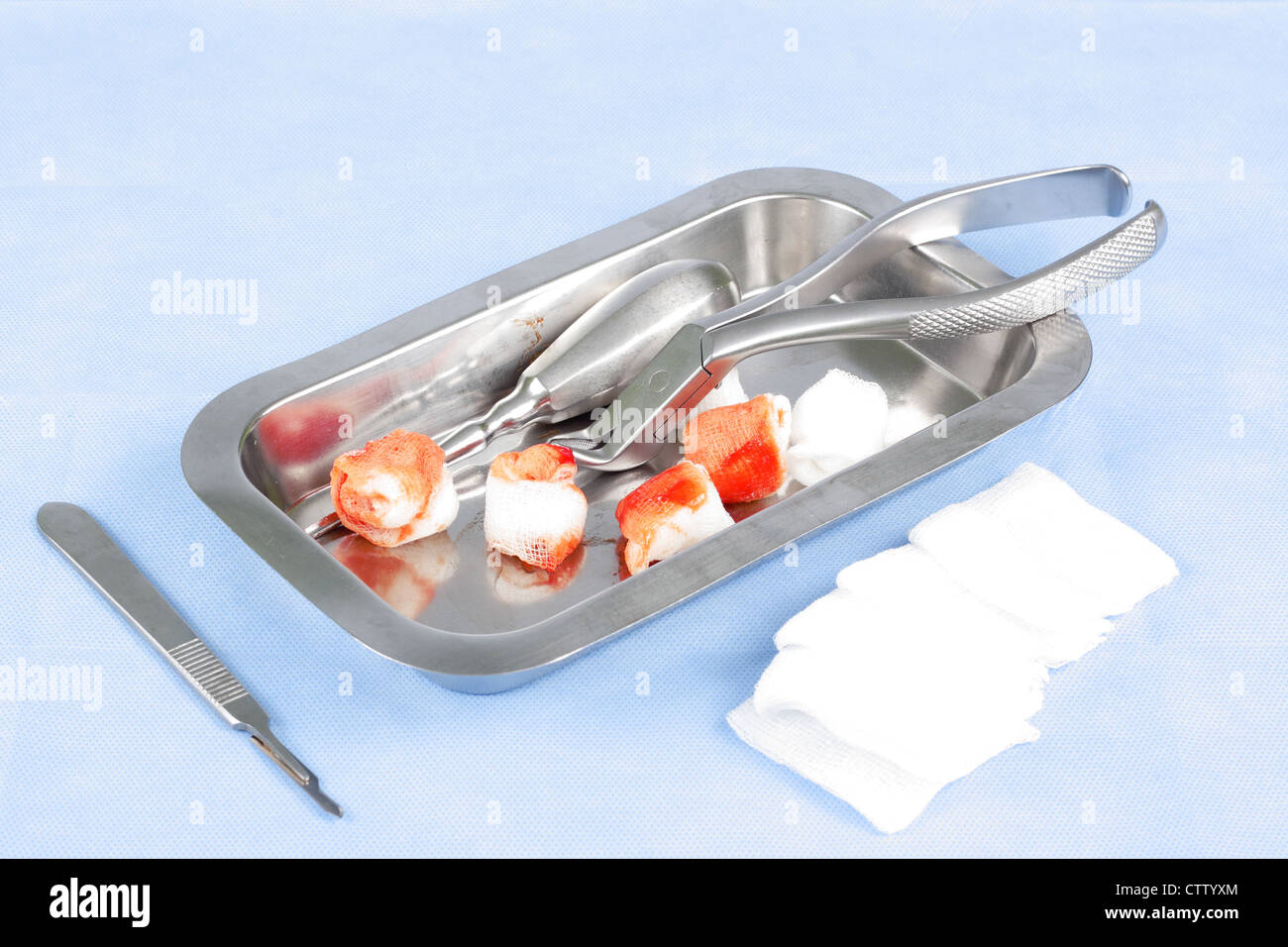 Cuvette with dental tools to removing teeth Stock Photo Alamy