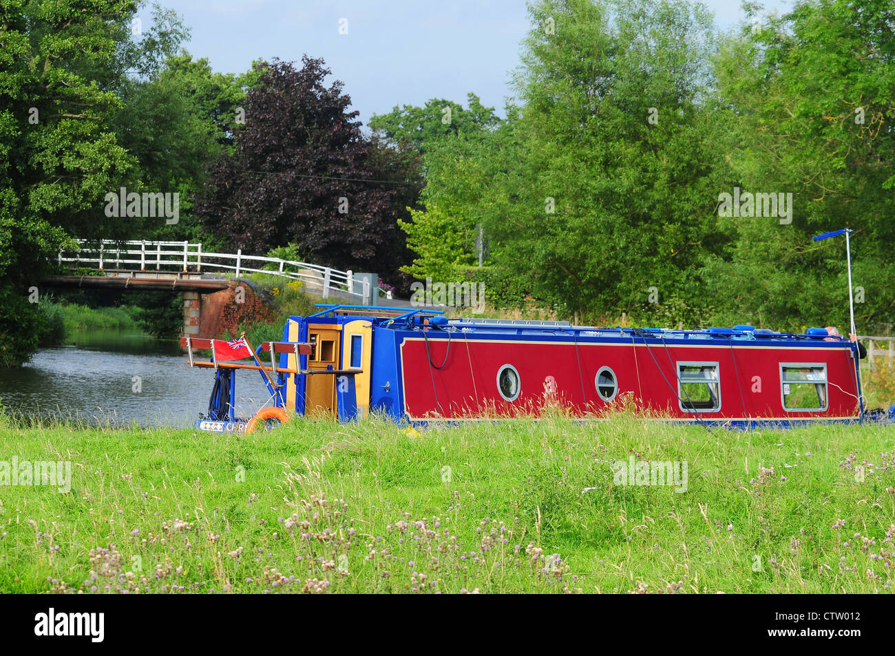 A canal boat on the River Wey Navigation Surrey UK Stock Photo