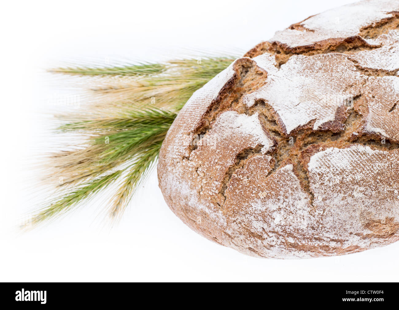 Loaf of bread with wheat isolated on white background Stock Photo - Alamy